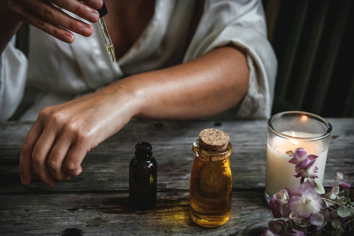 Bottles of supplements for menopausal women arranged on a wooden table with natural light